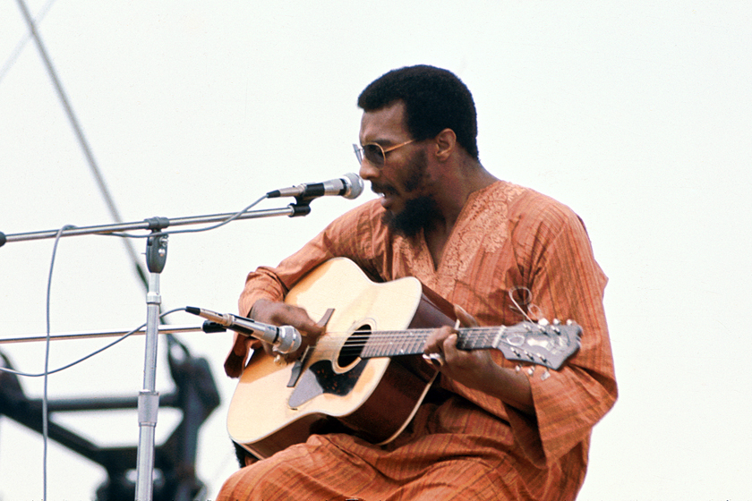 Richie Havens playing a Guild Guitar at Woodstock